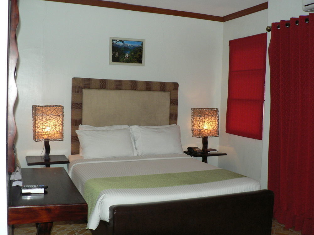 Ecoland Suites & Inn Davao Bagian luar foto